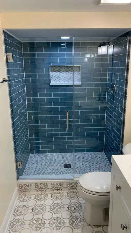 Blue tile shower enclosure