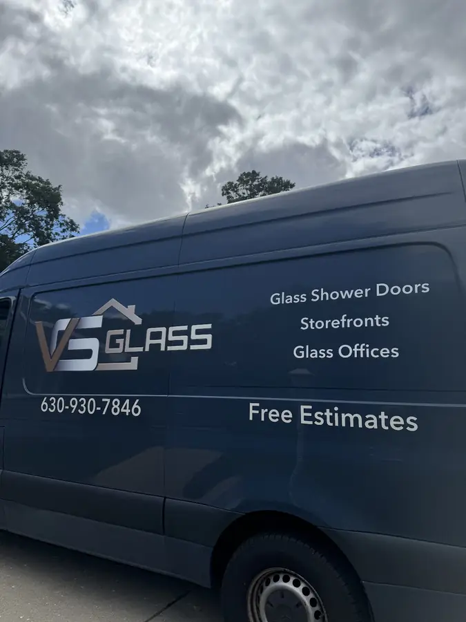 VG Glass branded service van — glass shower doors, storefronts, glass offices